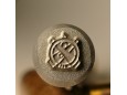 Stempel Skrzyżowane Działa, Ordinance Wheel